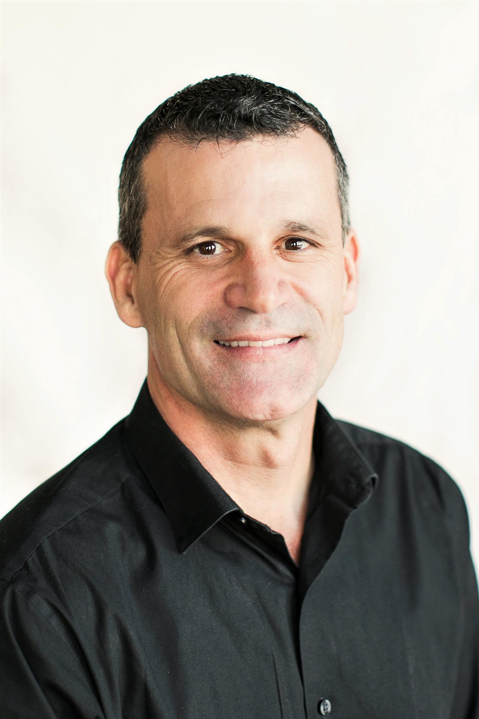 A headshot of Nick Greenwell, the owner of Burley Physical Therapy